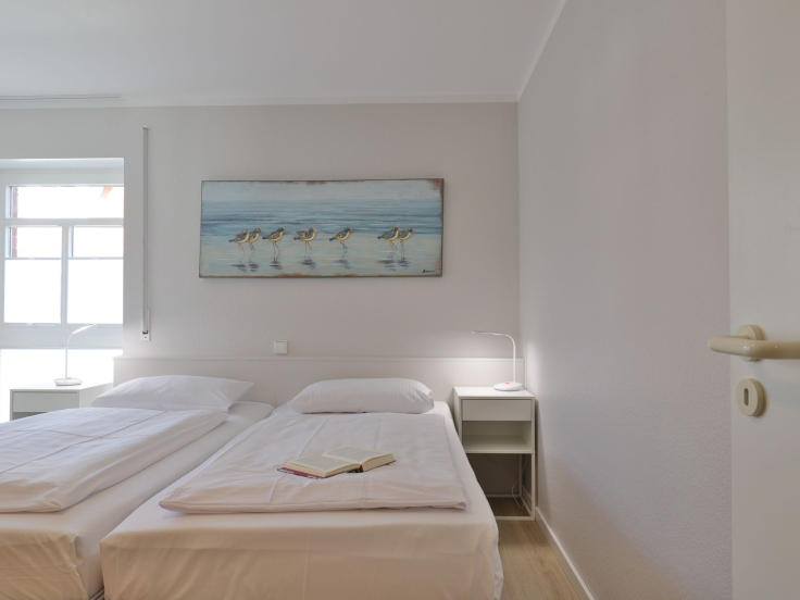 Haus am Meer, Whg.06 - Blick in das Schlafzimmer mit einem schönen Doppelbett