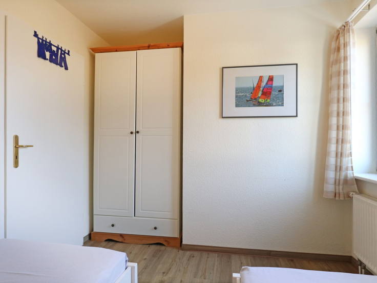 Papillon Whg. Nr. 11/8 - Blick in das Schlafzimmer auf der unterern Wohnebene