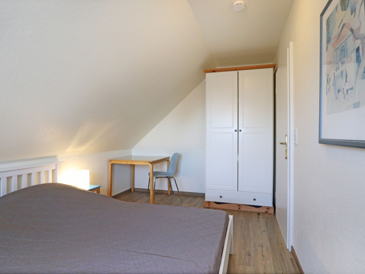 Papillon Whg. Nr. 11/8 - Blick in das Schlafzimmer im OG (links)