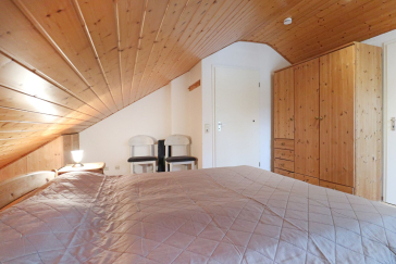 Urlauberdorf 31a - Blick in das Schlafzimmer im OG