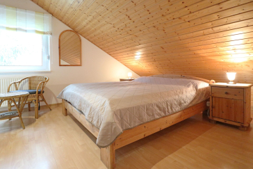 Urlauberdorf 31a - Blick in das Schlafzimmer im OG